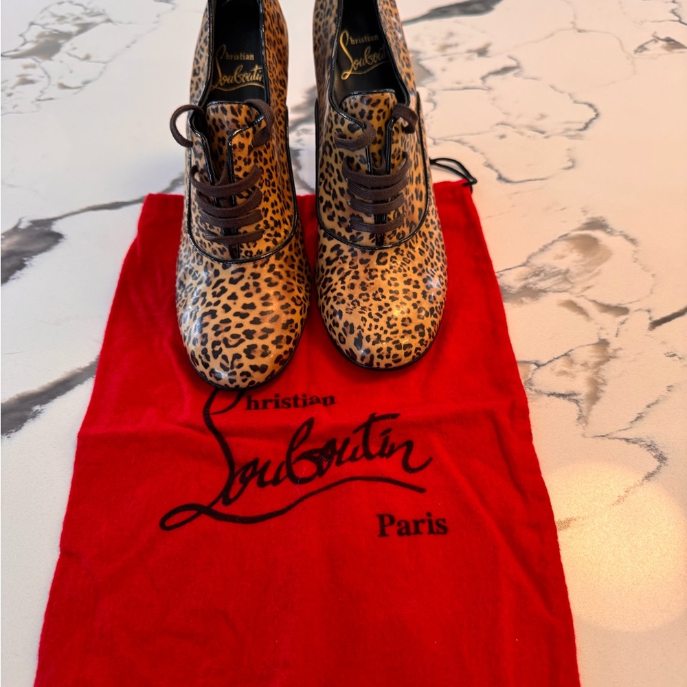 Christian Louboutin Animal Print Lace-Up Shoes